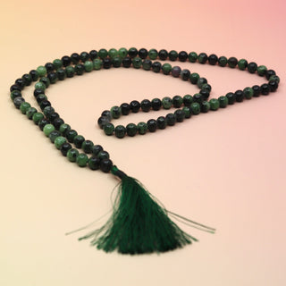 Ruby Zoisite 108 Mala Necklace on pink and orange background