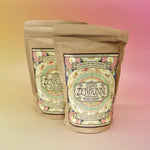 Side-by-side ZenBunni coffee bags showing front labels and artisan packaging