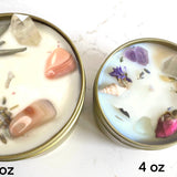 Two candles, one 4 oz and one 8 oz, next to each other on a white background.