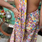 Back tie detail on convertible rainbow boho jumpsuit