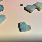 Polished Amazonite crystal heart with natural blue green coloring
