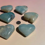 Amazonite crystal heart connected to the Heart and Throat Chakras
