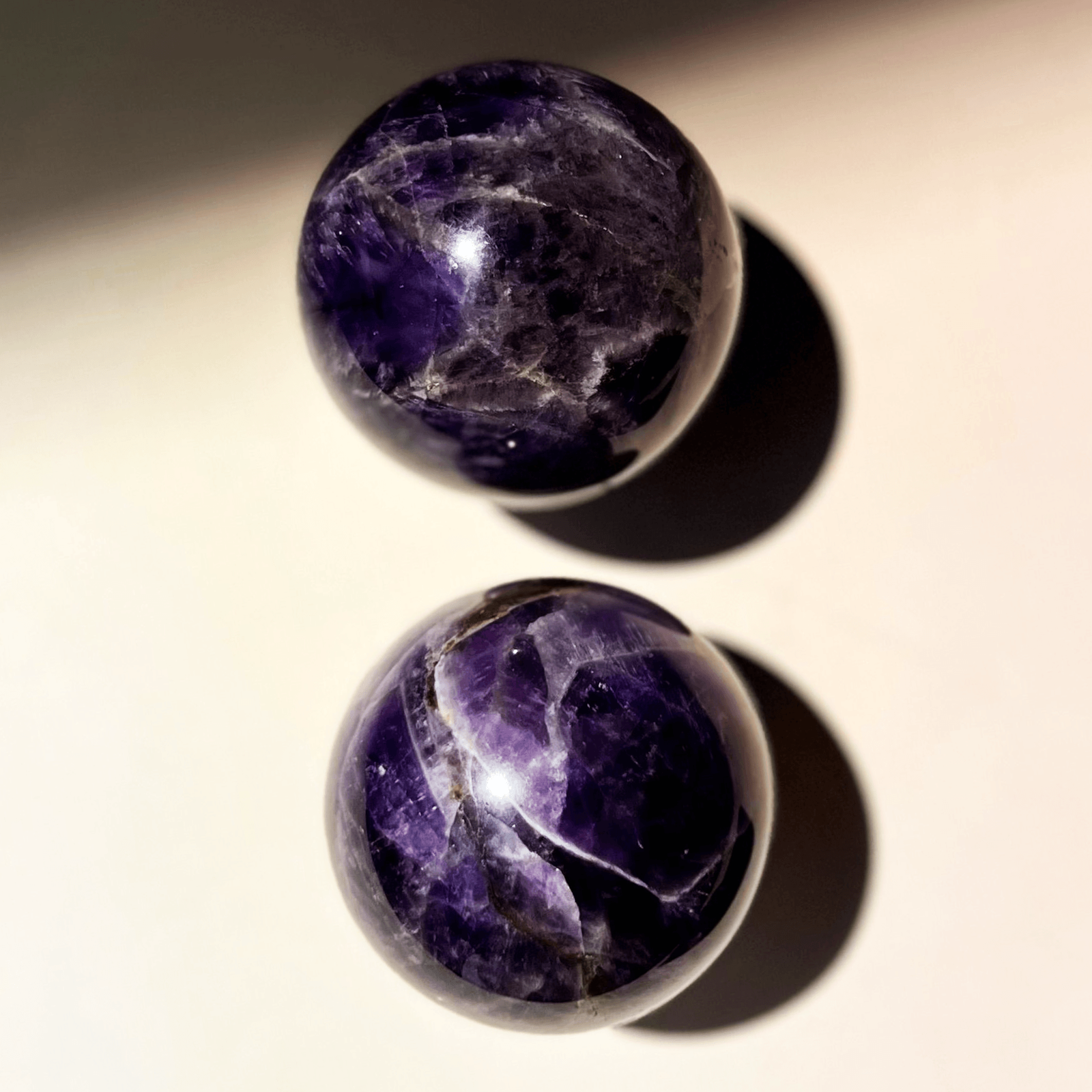 Natural amethyst quartz sphere with rich violet tones used for meditation and spiritual clarity