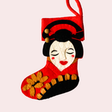 Decorative stocking with a geisha design on a beige background