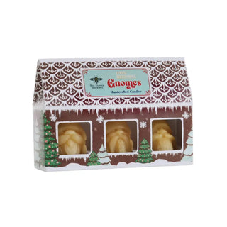 The 3 Pack Beeswax Holiday Gnome Candles in their packaging on a white background.