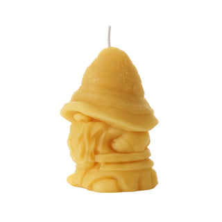 The Beeswax Large Holiday Gnome Candle on a white background.