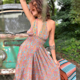 Close-up of back bow on silk maxi boho dress