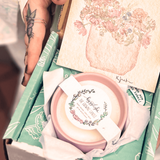 Mother’s Day gift ideas at The Boho Depot in Winston-Salem featuring growing candles, crystals, and boho boutique items
