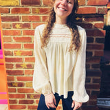 boho-chic outfit featuring woven mock neck lace top in neutral tones