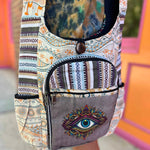handmade boho bag with spiritual print and orange patterns