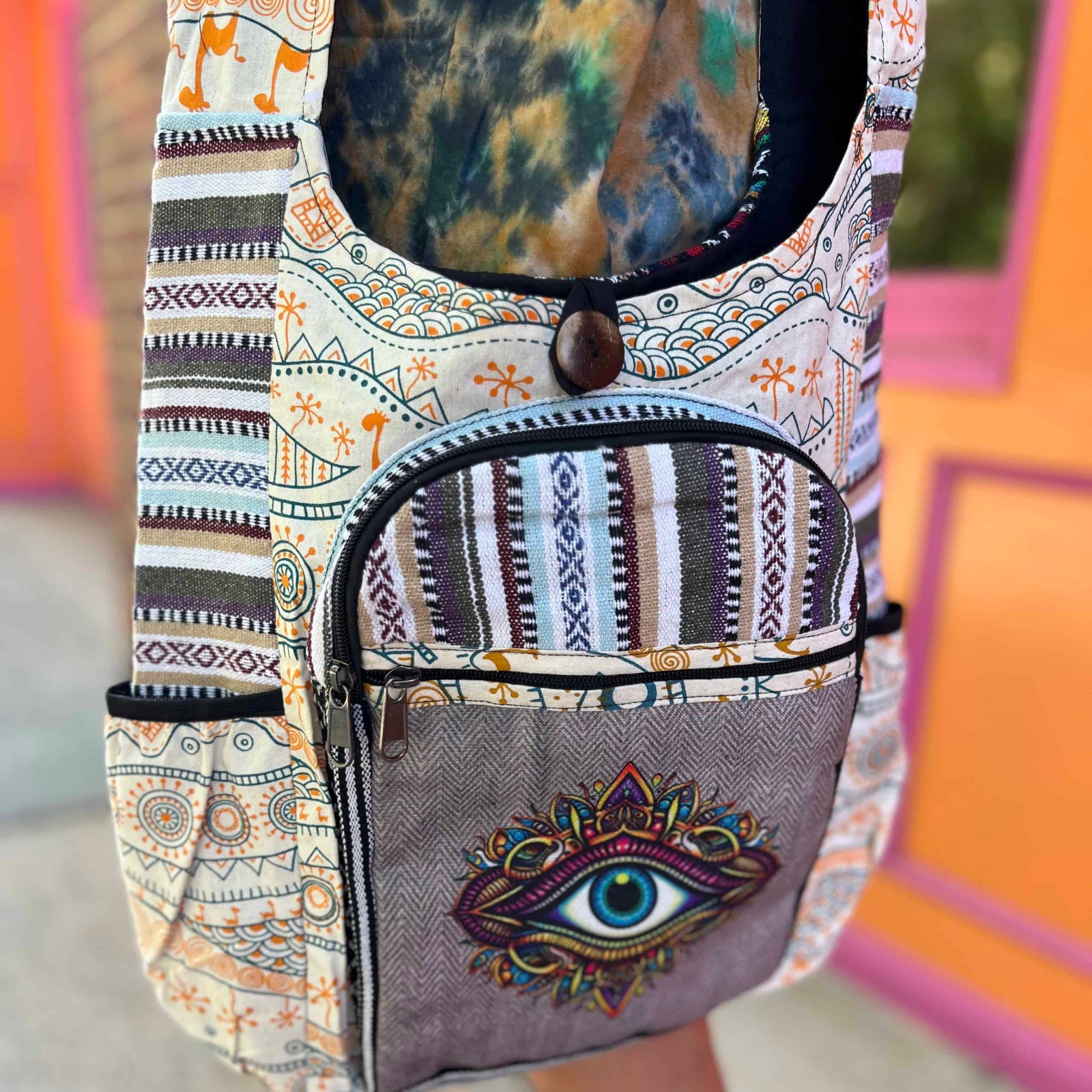handmade boho bag with spiritual print and orange patterns