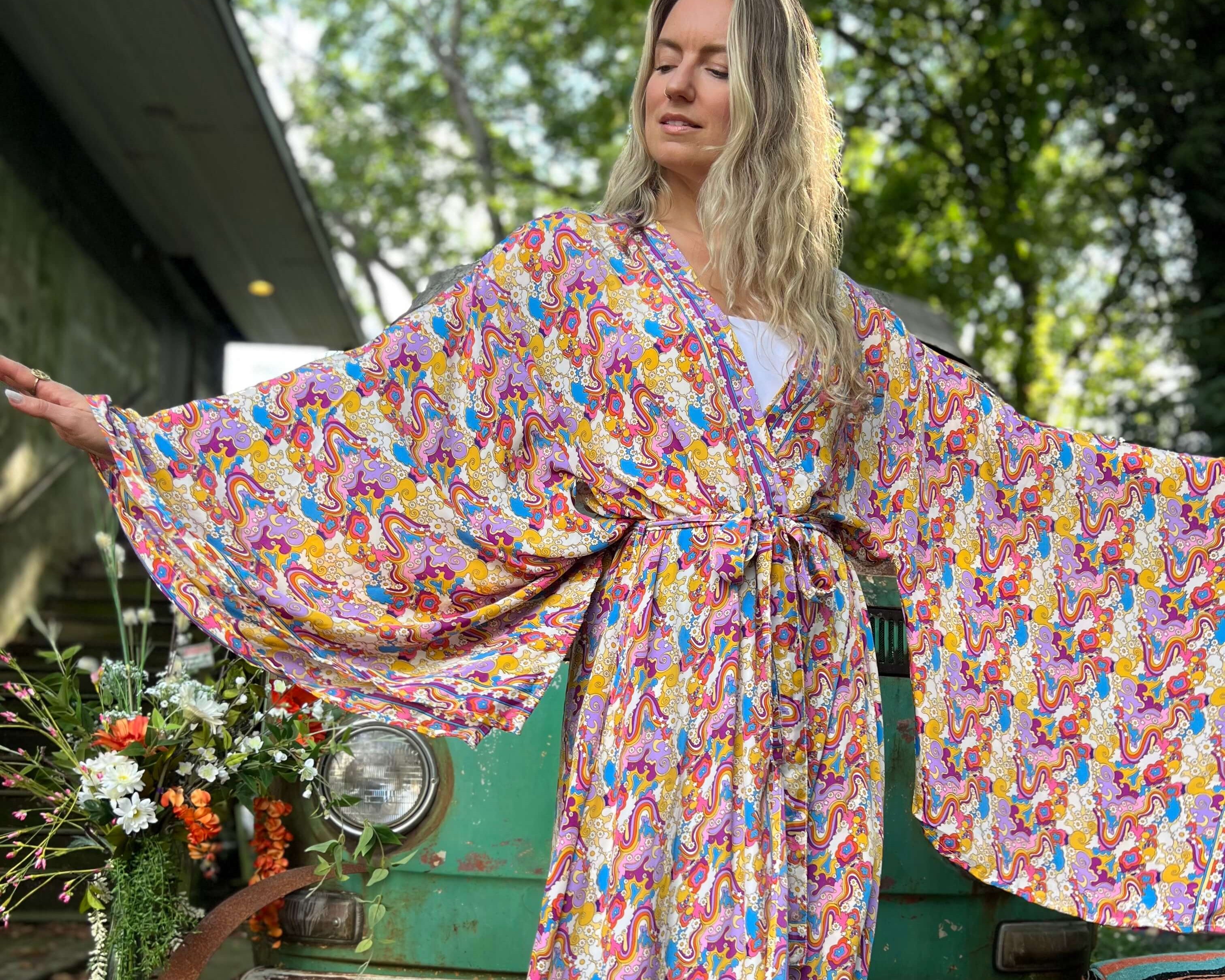 Models wearing boho kimonos including kimono robes and long duster styles