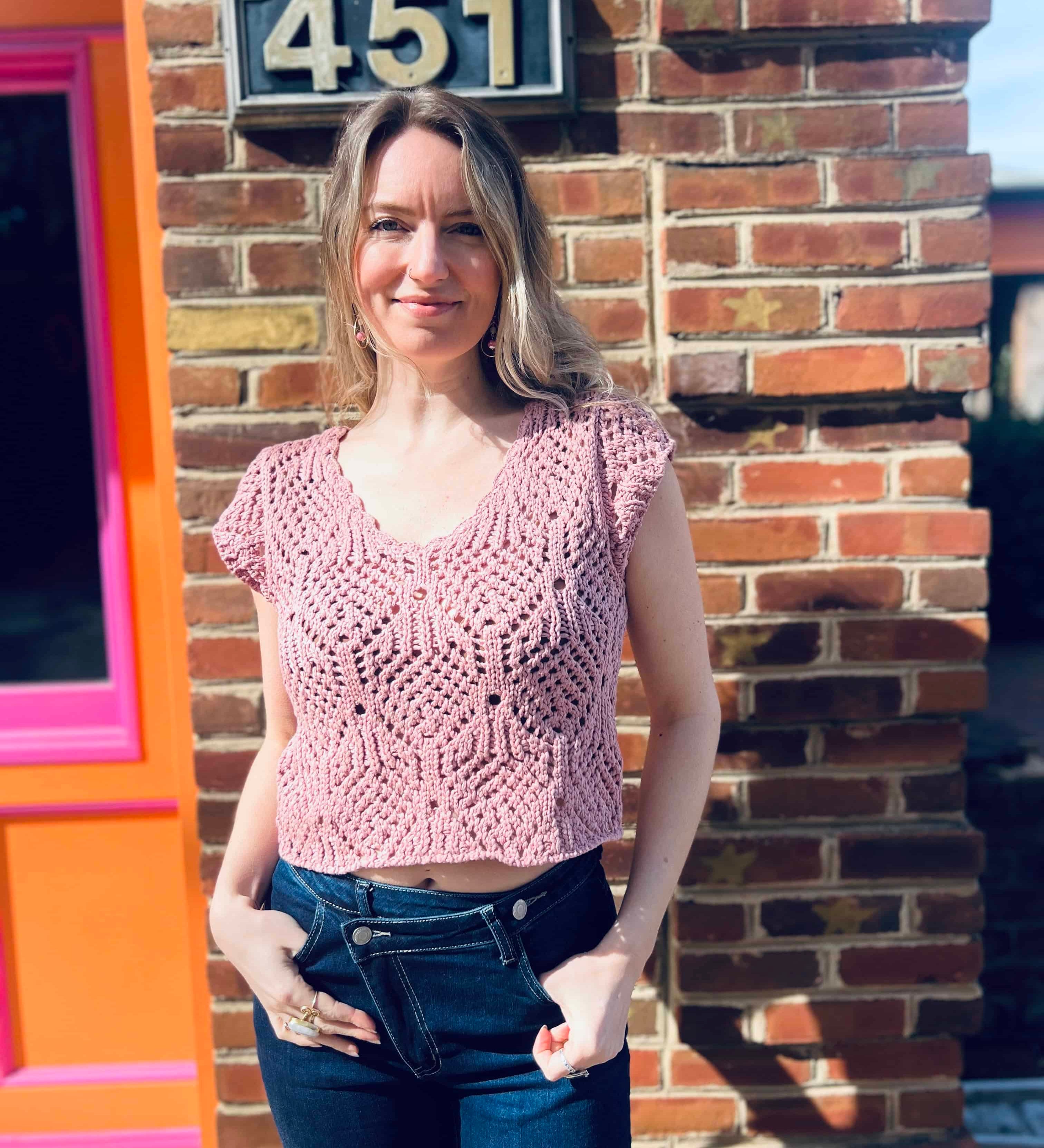 boho cotton crochet sweater top styled with cute hippie jeans in front of the boho depot store front