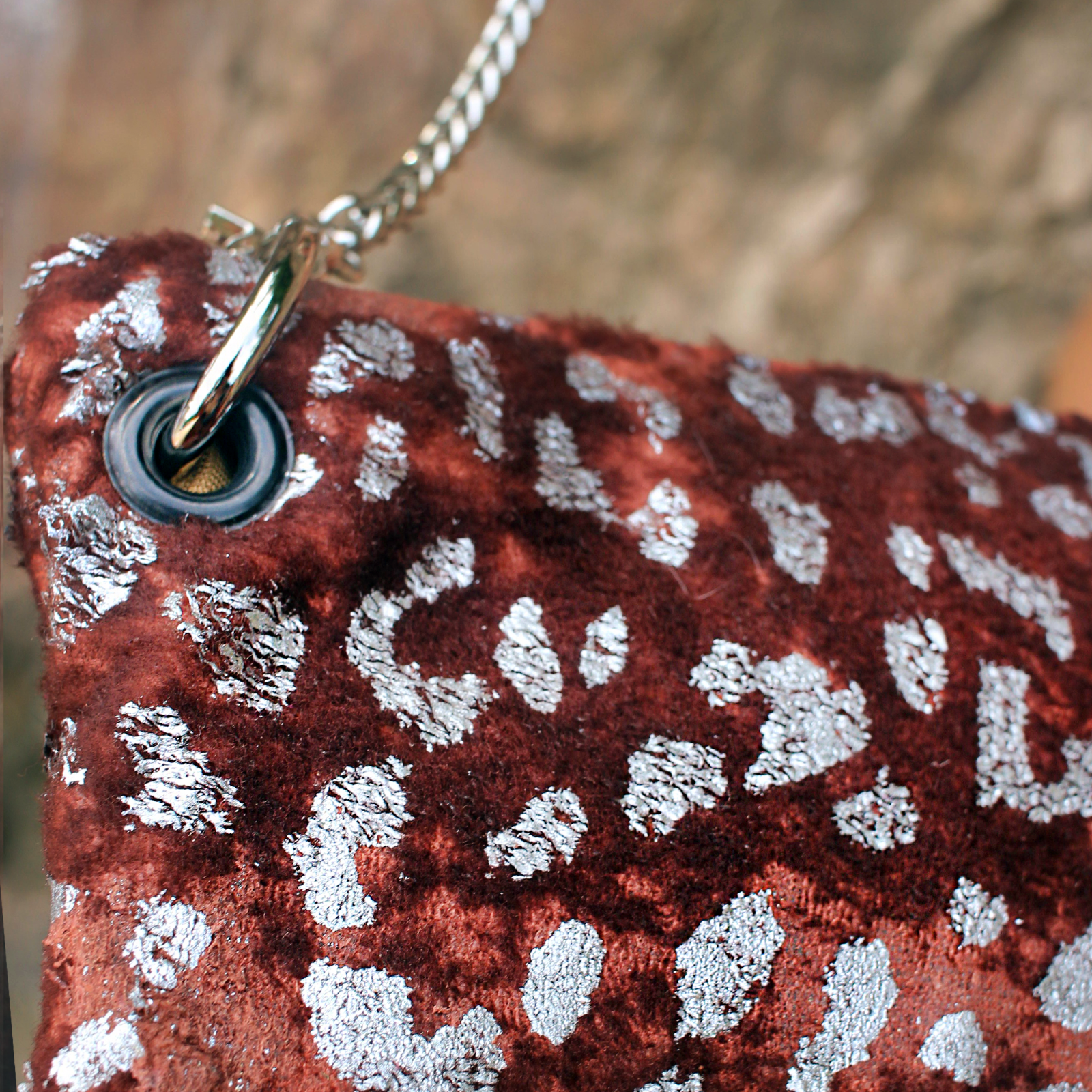 An up close image of the Garnet and Chrome Leopard Crossbody.