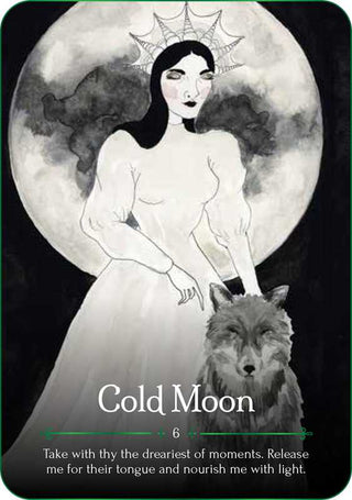 One of the oracle cards with a drawing of a black-haired woman in a white dress and a gray wolf.