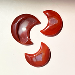 Carnelian crystal crescent moons in red and orange tones sized 1.9 to 2.5 inches with natural variations