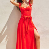 The red heaven corset flutter dress in front of a white background.