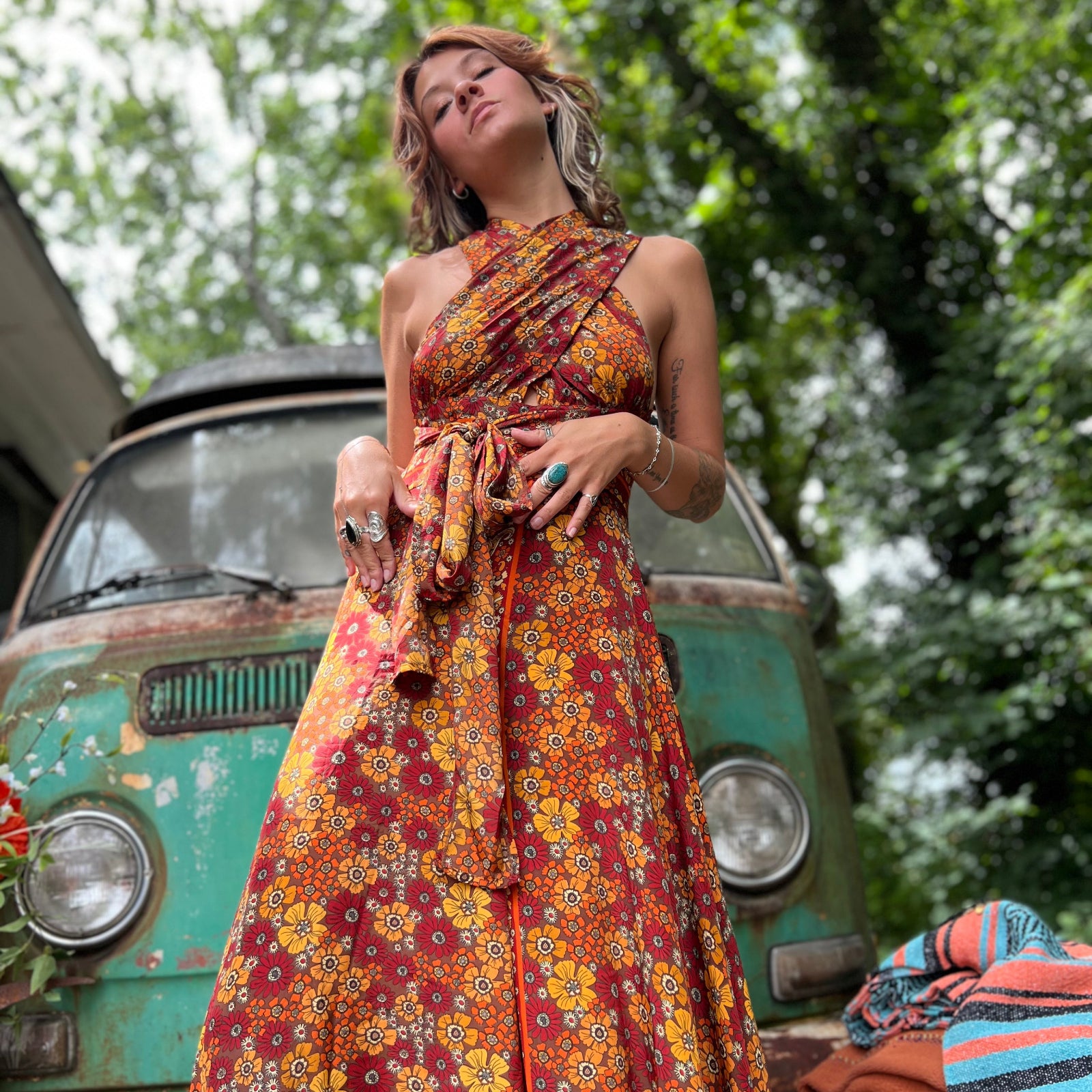 Front view of bohemian rainbow silk jumpsuit with adjustable ties