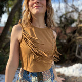 Close up detail of faux suede fringe top with metal stud accents