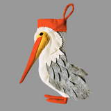 Felt pelican christmas stocking decoration on a light blue background