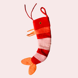 Plush shrimp christmas stocking on a white background
