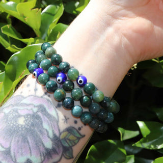 Moss Agate beaded bracelet with evil eye charms