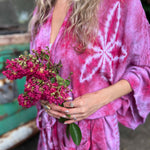 Model wearing bohemian hand-dyed kimono outdoors in natural light