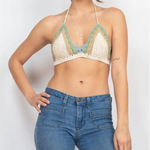 A woman wearing the off white Festive Crochet Top: One Size with jeans.