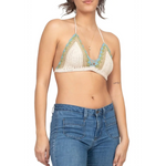 A woman wearing the off white Festive Crochet Top: One Size with jeans.