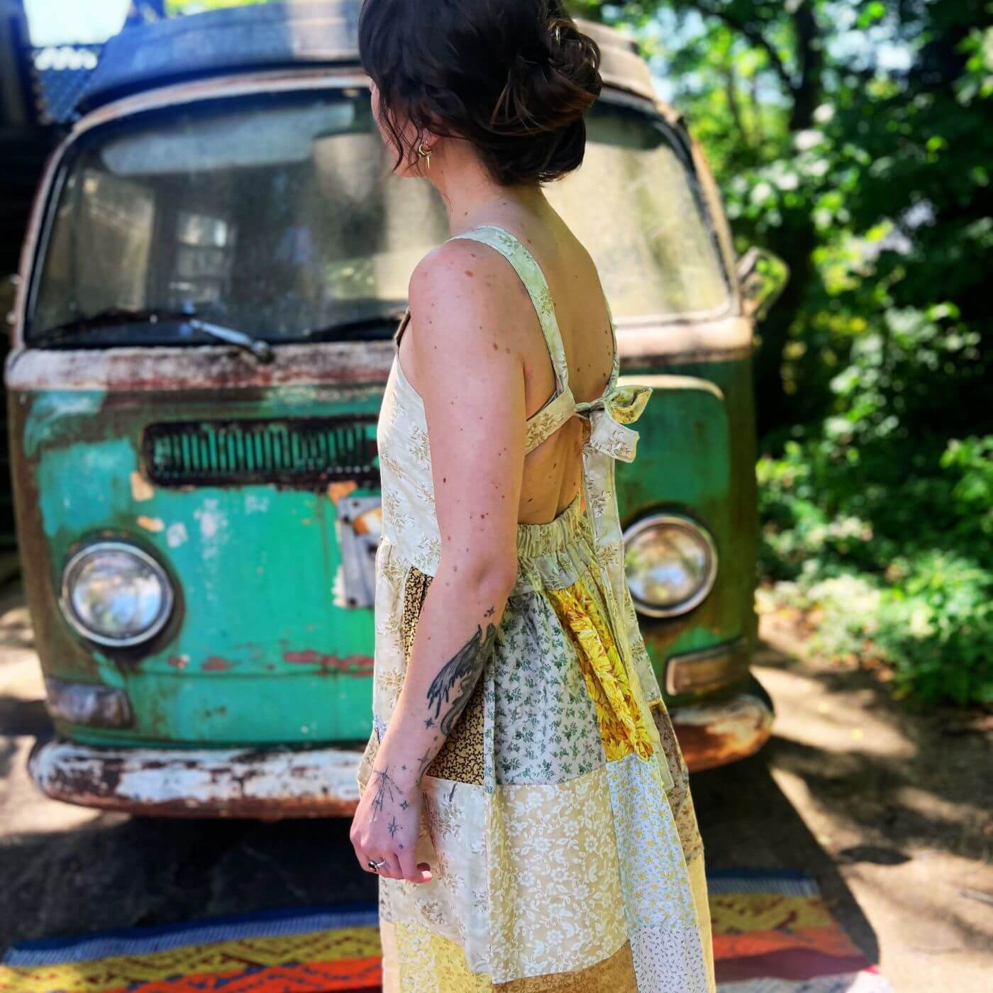 Side profile of floral patchwork prairie maxi dress