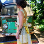 Side profile of floral patchwork prairie maxi dress