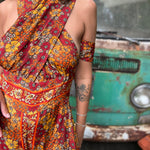 Convertible boho jumpsuit styled with one-shoulder tie