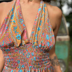 Front detail of tassel ties on silk boho maxi dress