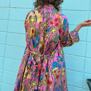 Model standing full-length in Frida Kahlo kimono back view
