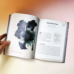 Open Goth Garden book showing blackberry botanical illustration and folklore