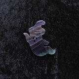 Crystal ghost carvings displayed for meditation and spiritual practices.
