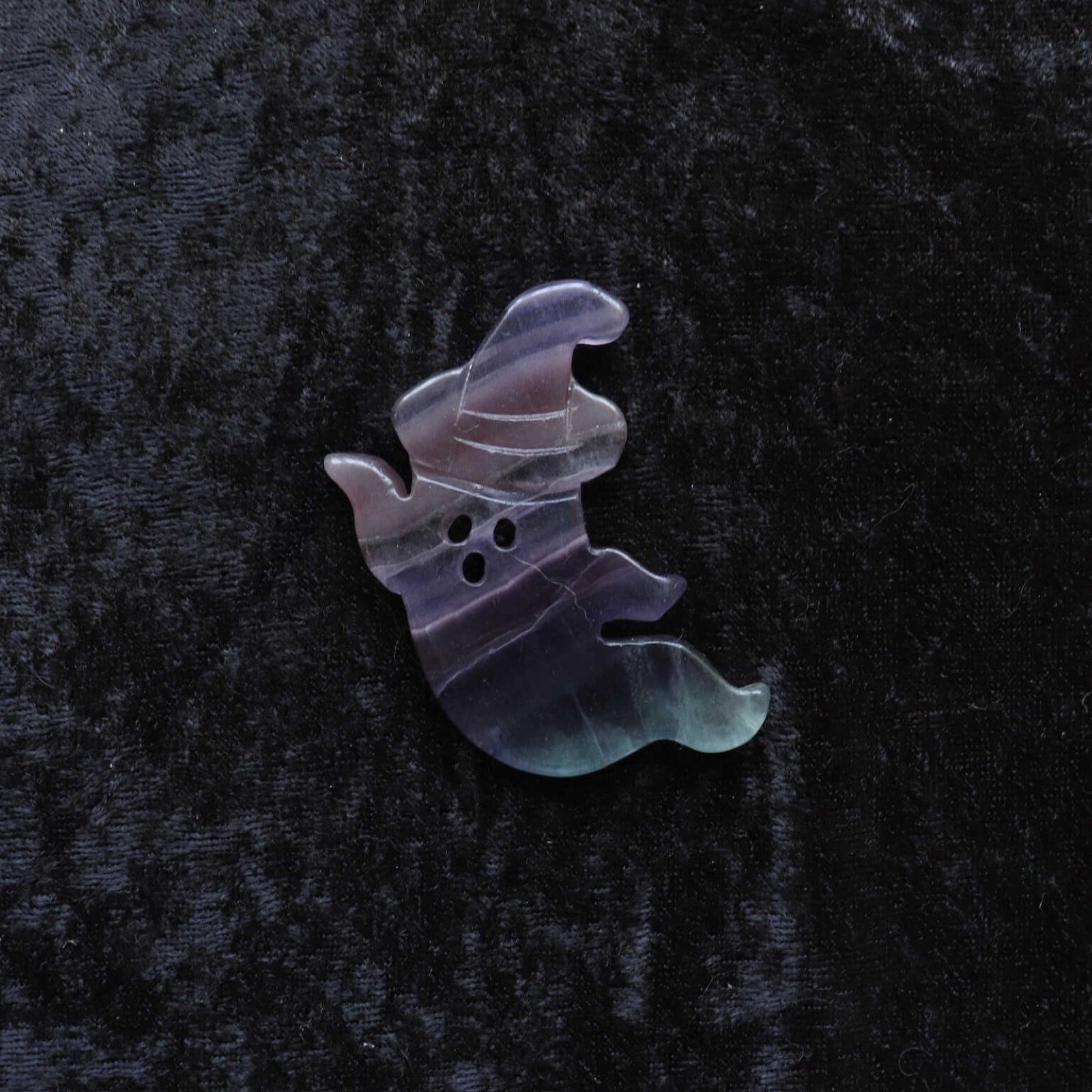 Crystal ghost carvings displayed for meditation and spiritual practices.