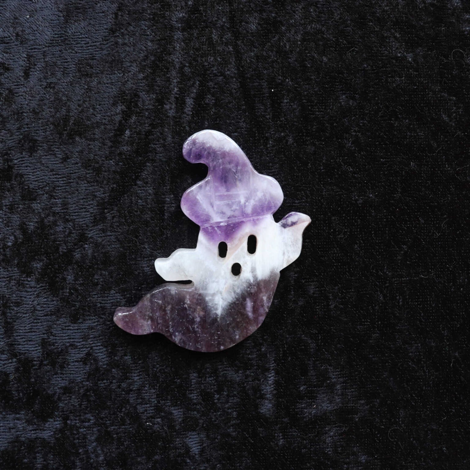 Chevron amethyst crystal ghost carving for intuition and protection.
