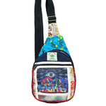 Close-up of third eye and mushroom embroidery on hemp crossbody bag on white background