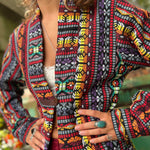 Unisex festival trench coat layered over casual boho outfit