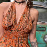 Tiered silk fabric close-up on bohemian maxi dress