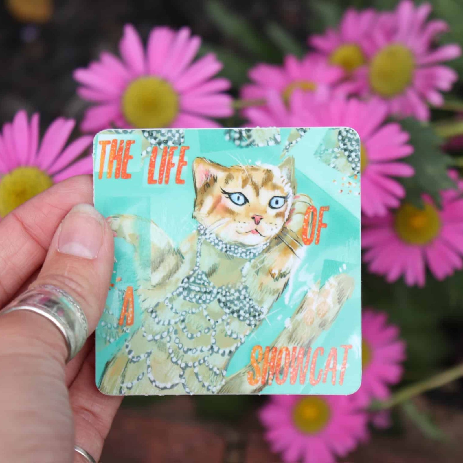 Funny cat vinyl sticker with showgirl costume – cute pop culture decal for Swifties and cat lovers