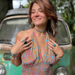 Back shot of hippie style bohemian silk maxi dress with bow tie