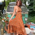Close-up of bow tie detail on boho maxi silk dress back