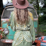 Back lotus flower tie dye shot on green hippie boho kimono