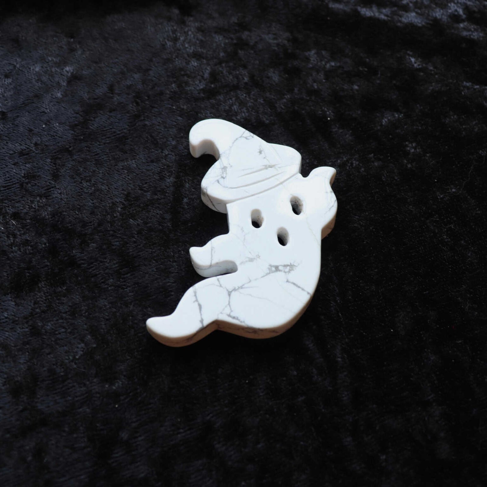White howlite crystal ghost carving for calming and stress relief.