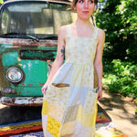 Cottagecore prairie dress featuring large patchwork pockets