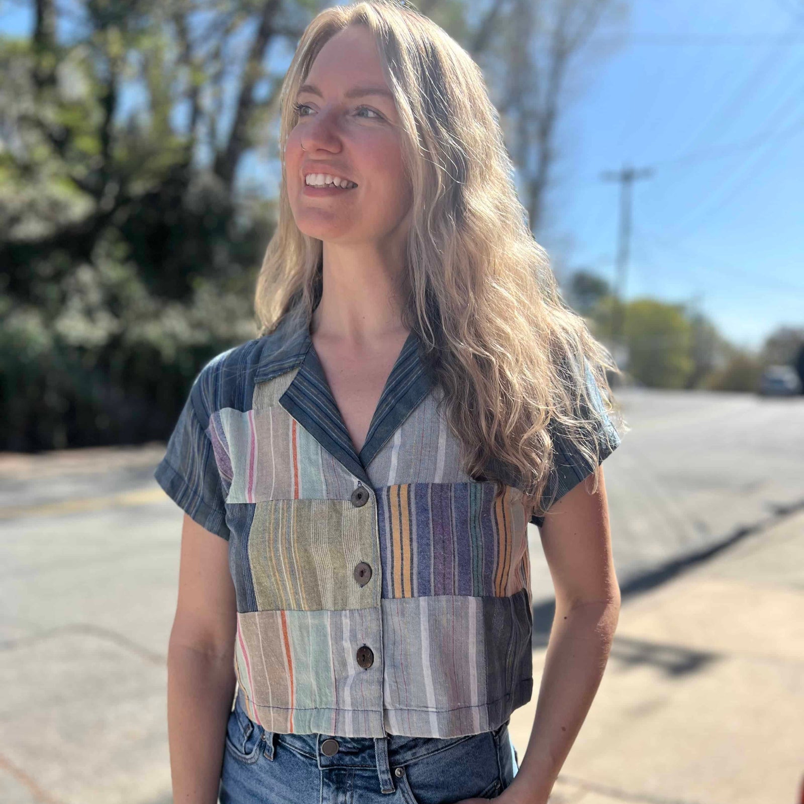 patchwork cropped blouse with denim colors on model