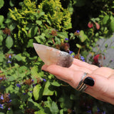 Close-up of pink agate butterfly carving showing unique colors