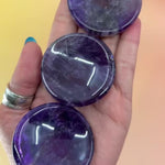 Amethyst Crystal Sphere stand videos in hand showcasing 3 crystal stands